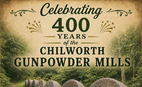 Millstones from the Chilworth Gunpowder Mills lining a woodland path
